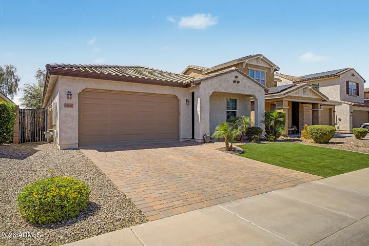 Upgraded paver driveway and turf landscaping