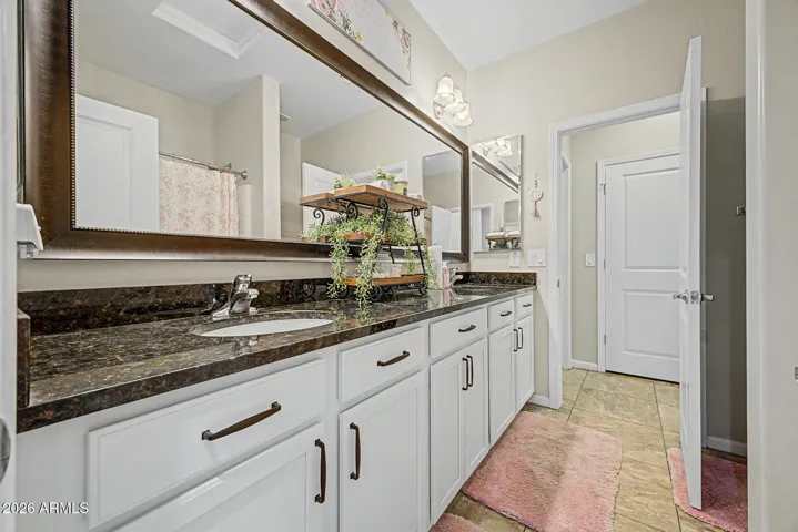 Helps connect bedroom 2 and bedroom 3. The double sinks a big plus