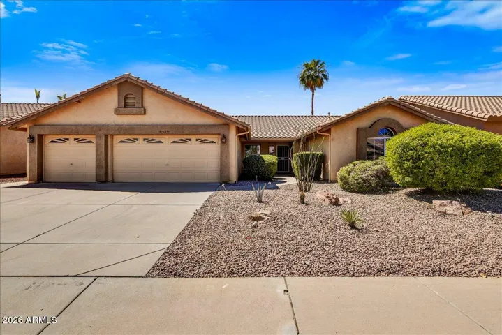 Welcome to this beautifully maintained Camelback model featuring classic desert curb appeal and a spacious 3-car garage.