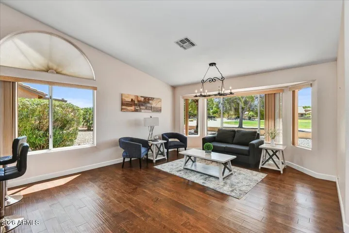 The informal family room area adjacent to the kitchen is perfect for relaxed daily living.