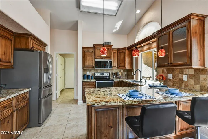 Ample cabinet space and a thoughtful layout make this kitchen as practical as it is beautiful.