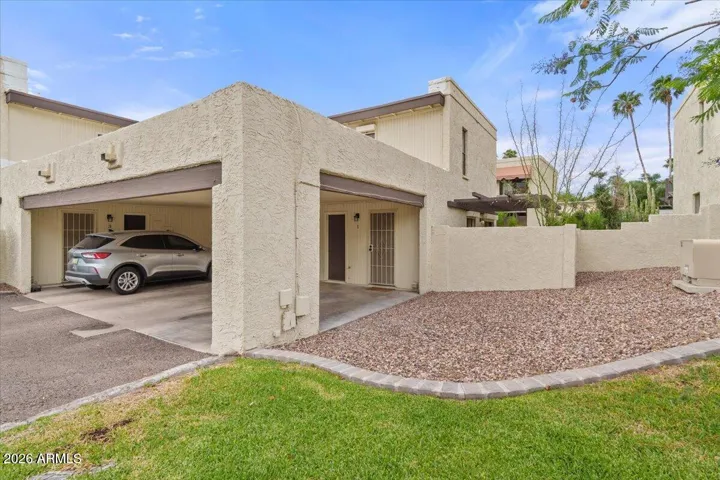 End unit - Covered parking & additional storage room