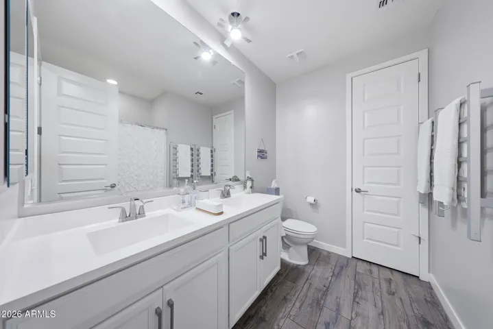 Dual Sinks and Custom Heated Towel Drying Racks