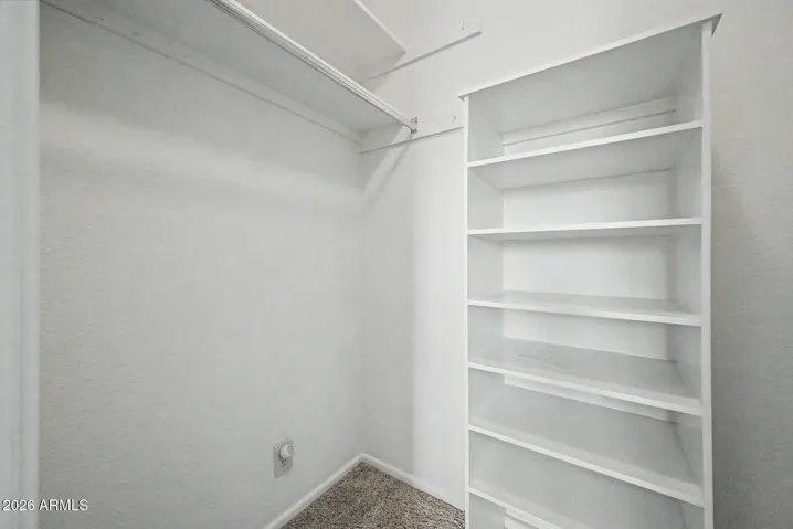 Primary closet is big enough for two!