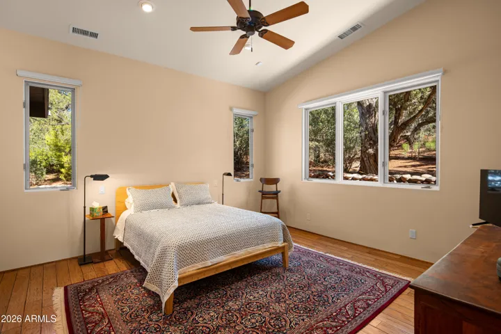 Outlets on both sides of the bed and an extra closet in this room!