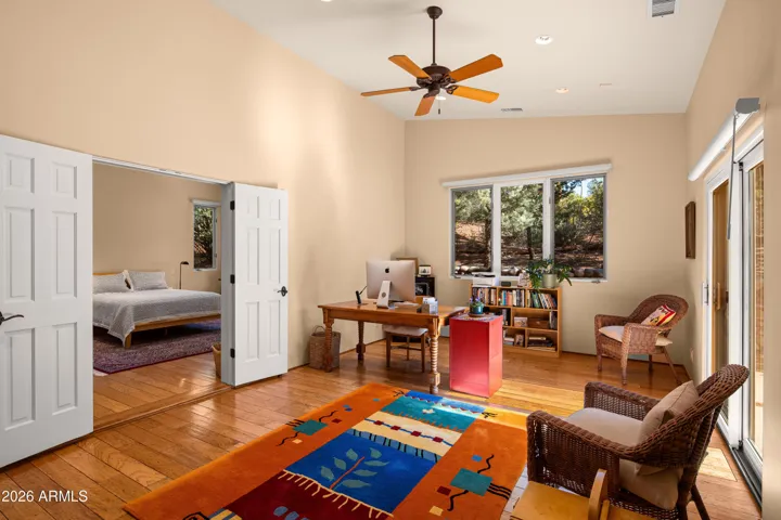 This is the Office/Meditation Room(I love the light in this room)/Library/Den/Workout Room.