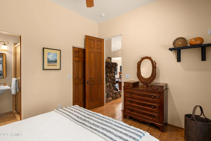Away from the primary bedroom, this guest suite is very private.