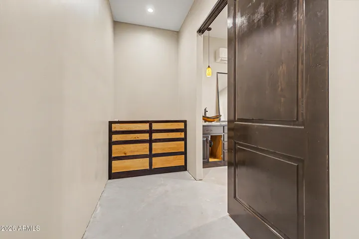 The spacious primary closet is a blank canvas ready for your vision, whether you prefer a custom built-in system, boutique-style wardrobe displays, or floor-to-ceiling shelving, the generous square footage gives you the freedom to design the dream closet you've always wanted.