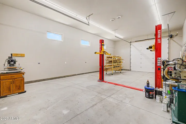 This property delivers the ultimate garage setup with a massive 6-car garage combined with a dedicated drive-through RV bay, meaning there is finally enough room for every vehicle, toy, trailer, and tool in your collection. Pull your rig straight through, park the whole fleet, and set up your workshop or hobby space because this is the property serious enthusiasts have been waiting for.