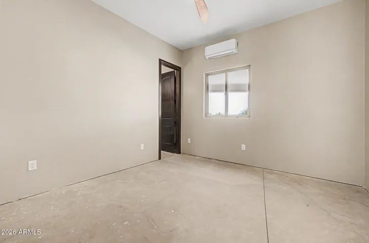 The spacious primary closet is a blank canvas ready for your vision, whether you prefer a custom built-in system, boutique-style wardrobe displays, or floor-to-ceiling shelving, the generous square footage gives you the freedom to design the dream closet you've always wanted.
