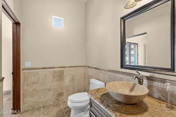 Half bath across from Media Room serves the main level