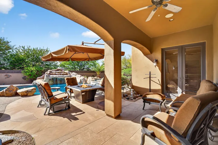 This covered patio is perfect when it's a bit "too sunny" or for those rare Arizona rains...