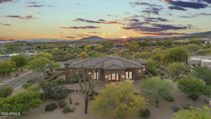 Set on an elevate acre, this Estate offers beautiful mountain and sunset views