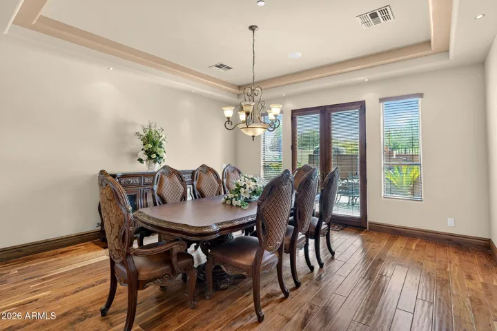Spacious Formal Dining with views to private courtyard