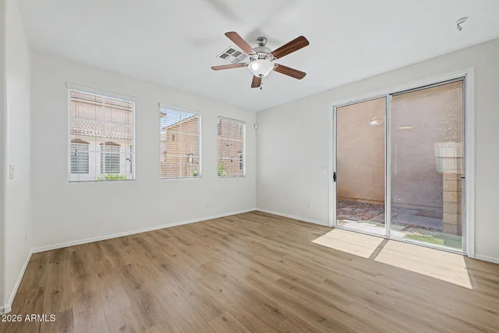 New flooring, large open and bright. Sliding doors open to fenced in patio/yard area.