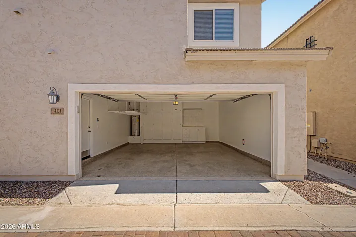 Complete with high-end epoxy flooring, built-in cabinetry and workbench.