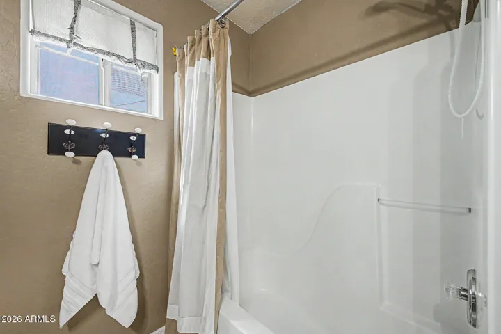 Upstairs hall bathroom with cute towel hooks!