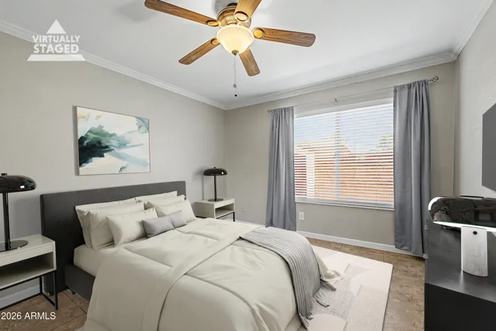Virtually Staged. Updated Ceiling Fan, Blinds, Curtains, Crown Molding, Upgraded Tile Flooring.