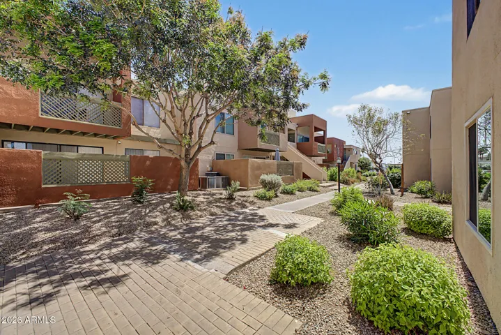 Beautiful Courtyard in front of unit. Mature Trees and Landscape.