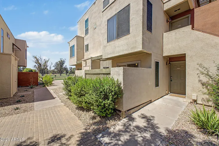 Front entry and path to Golf Course. Ground Floor Unit.