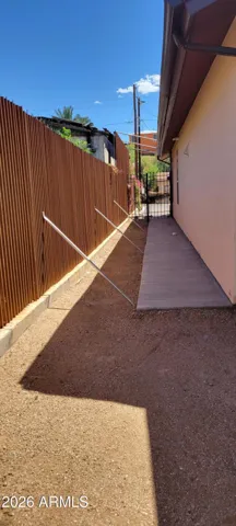 east side yard with a gate
