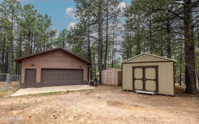 Garage = Extra Depth and multiple storage sheds.
