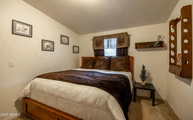 Main Home: Bedroom One, features Gun Safe and Walk In Closet