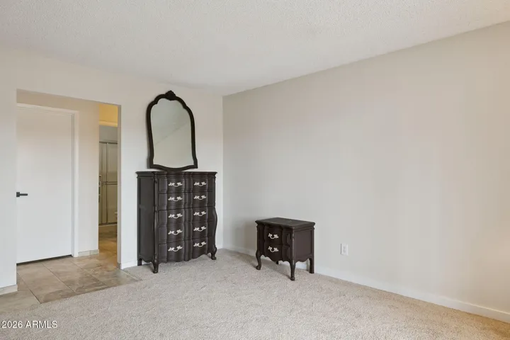Opens into ensuite bath & walk in closet,