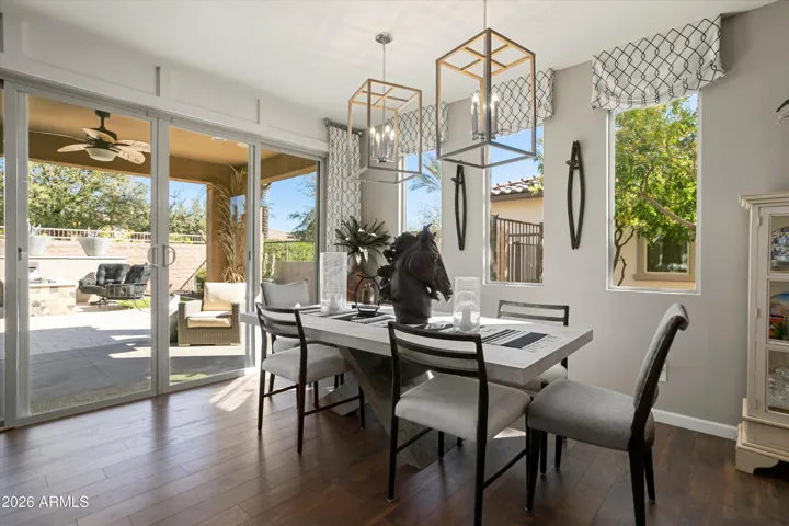 4-PANEL-SLIDE SLIDING GLASS DOORS. WINDOW BLINDS ARE ON REMOTE CONTROL.