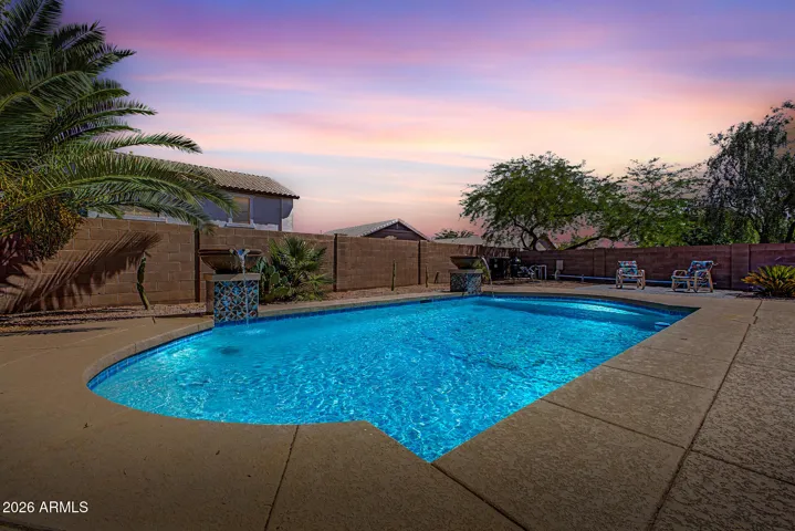 Beautiful newer heated pool with water features