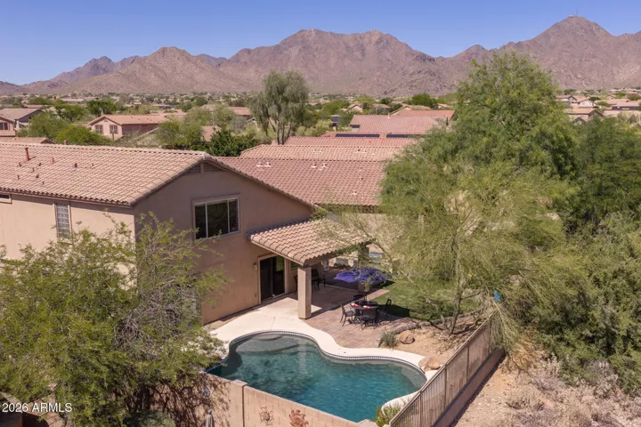 An aerial photo of the backyard, showcasing the McDowell Mountains.