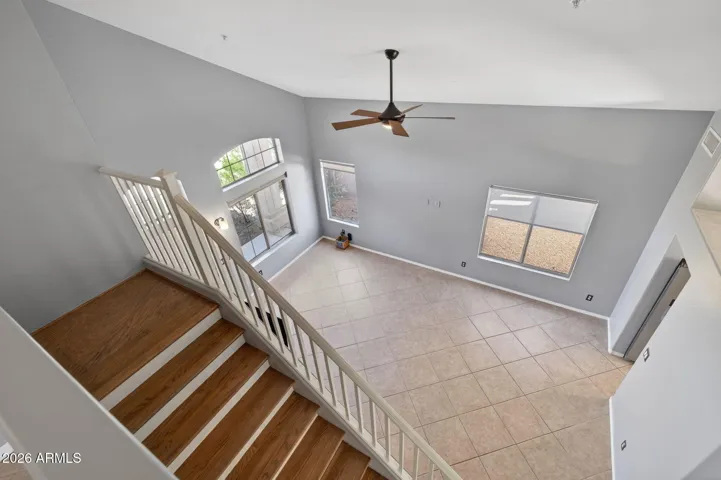 A view of the living room from the upstairs hall.