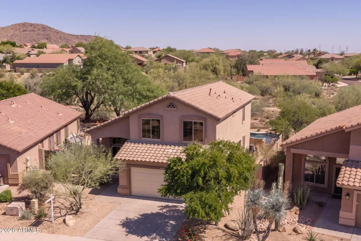 The home backs to natural open space, for added privacy.