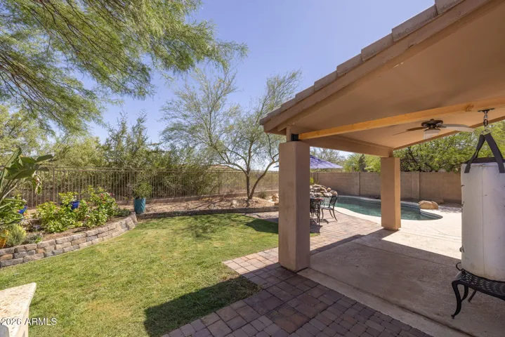 The low-maintenance landscaping is enhanced with a built-in irrigation system for easy upkeep.