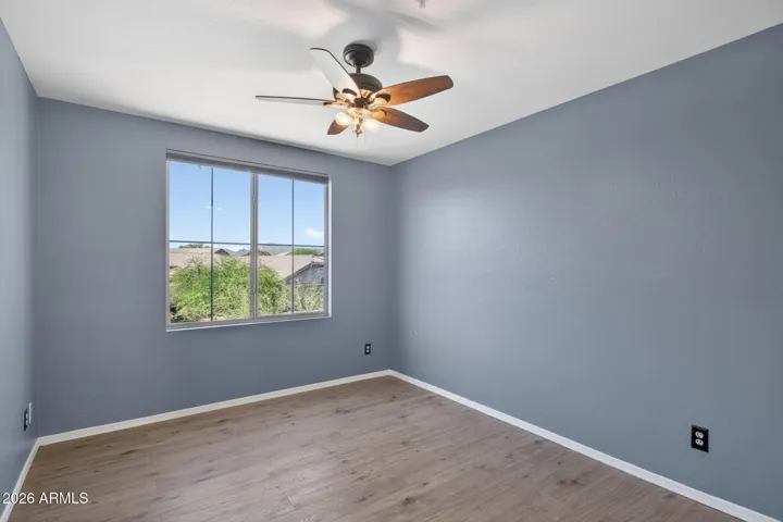 The first of two secondary bedrooms upstairs.