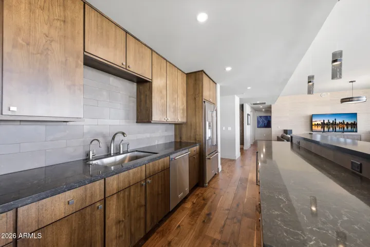 Floor to ceiling with pull-out shelving.