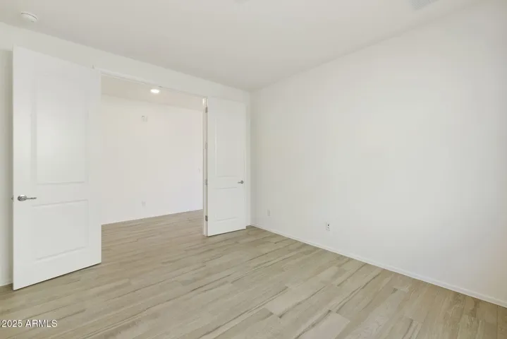 THIS ROOM IS PERFECT FOR A DEN, STUDY OR FORMAL DINING. ALL WOOD PLANK TILE FLOORING.