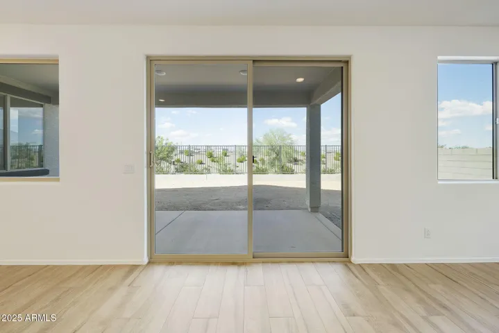BEAUTIFUL WOOD PLANK TILE FLOORING THROUGHOUT THE HOME MINUS THE BEDROOMS.