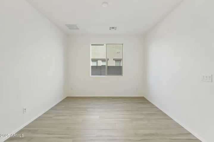 THIS ROOM IS PERFECT FOR A DEN, STUDY OR FORMAL DINING. ALL WOOD PLANK TILE FLOORING.