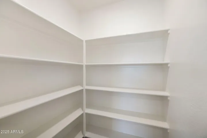 PLENTY OF STORAGE IN THE LARGE PANTRY