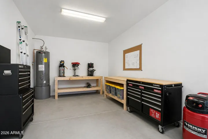 Work shop space, storage, plenty of space for your toys.