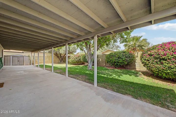 Nice fenced back yard with covered patio