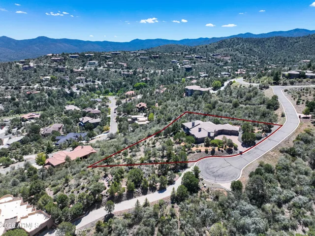 Rare find with unobstructed views with the additional lot for that privacy and protection
