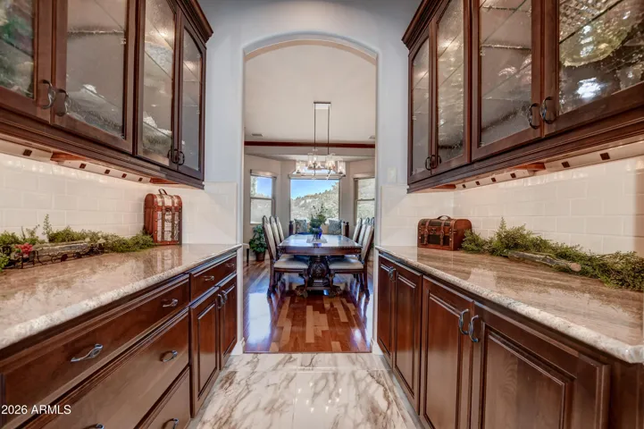 Provides extra storage, counterspace, complete with warming drawer and rain glass upper cabinets