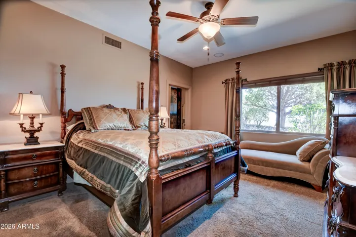 This bedroom features an en-suite or second primary bedroom