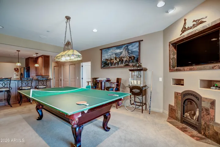 Opens to a full size kitchen which enhances the ample space for entertainment