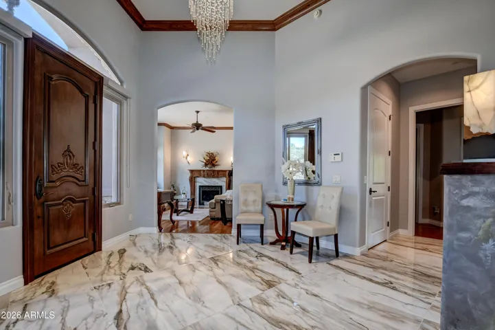 Welcomes you to this exquisite luxury home enhanced with crystal chandelier and meticulous attention to detail
