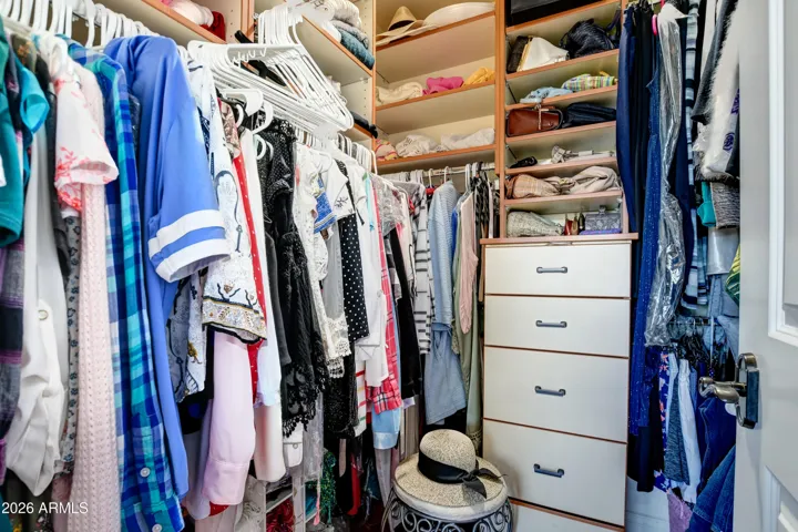 Her Closet with custom built in organization for all those personal accessories