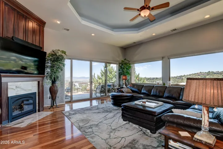Flow into the seamlessly open concept of this living area and step outside on the expansive deck