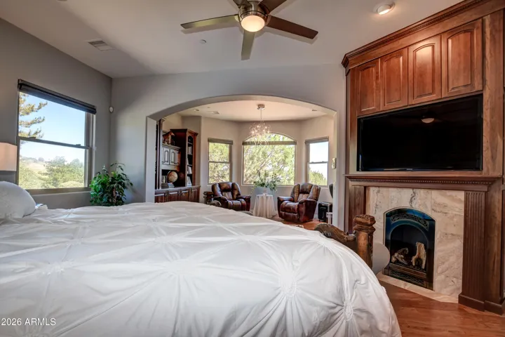 Gas fireplace and TV creates a tranquil retreat that combines comfort and style